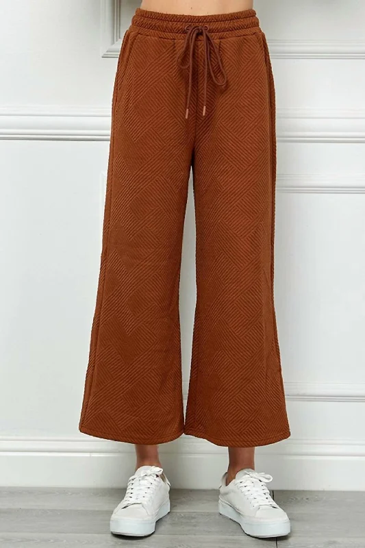 gym stretch pants -Textured Cropped Wide Pant In Rust